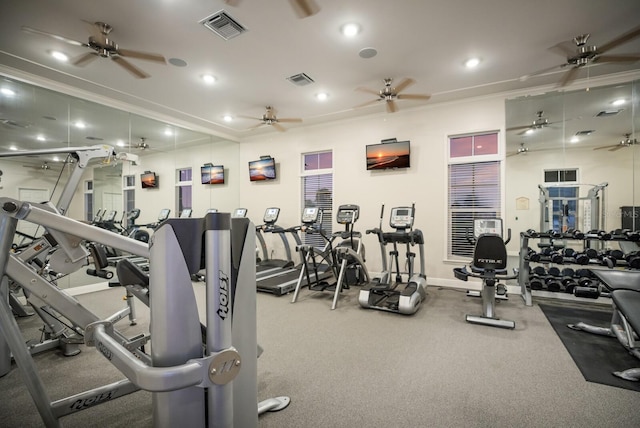 gym featuring ceiling fan and ornamental molding