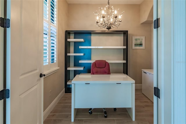 office area featuring a notable chandelier