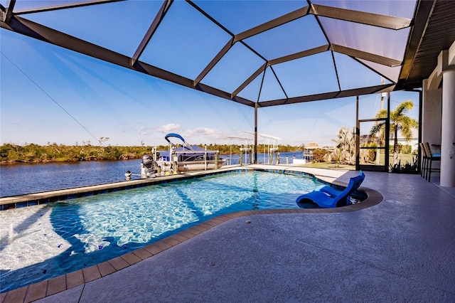 view of pool featuring a lanai, a patio area, and a water view