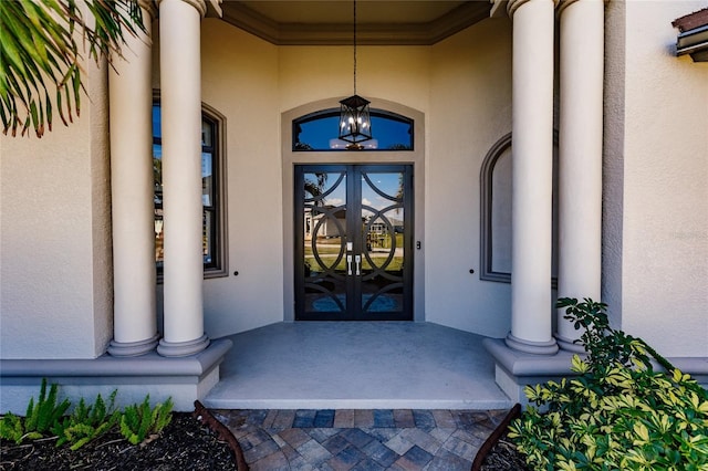 property entrance with french doors and covered porch