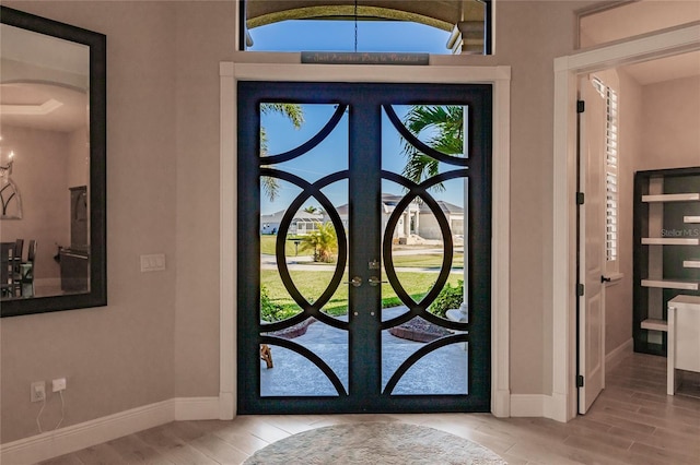 entryway featuring french doors