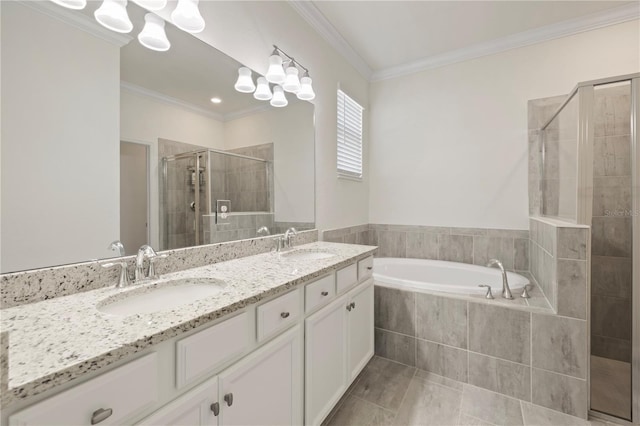 bathroom with plus walk in shower, tile patterned flooring, vanity, and crown molding