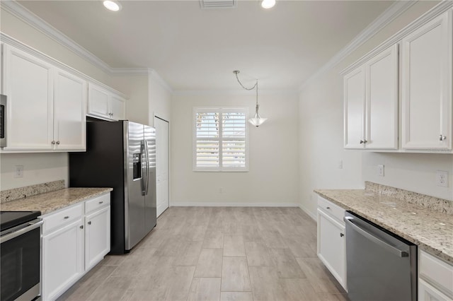 kitchen featuring light stone countertops, white cabinetry, and stainless steel appliances