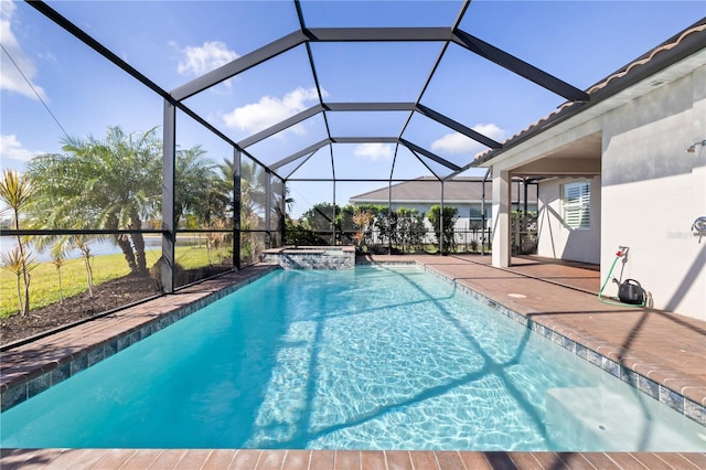 view of swimming pool with glass enclosure and a patio