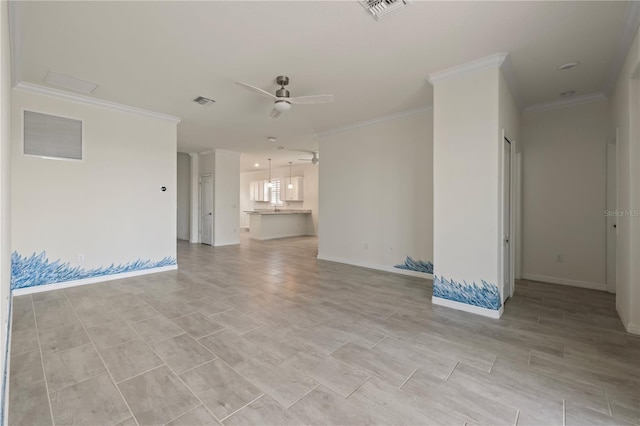 unfurnished living room with ceiling fan and ornamental molding