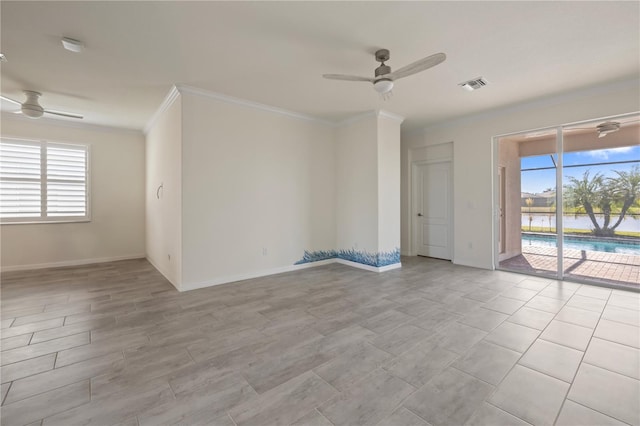 unfurnished room featuring ceiling fan, a healthy amount of sunlight, and ornamental molding