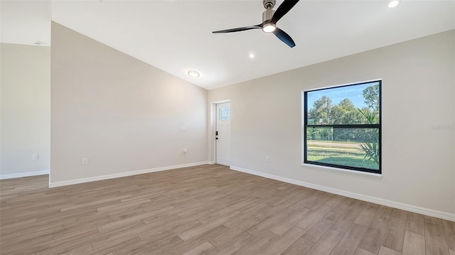 empty room with light wood-type flooring and ceiling fan