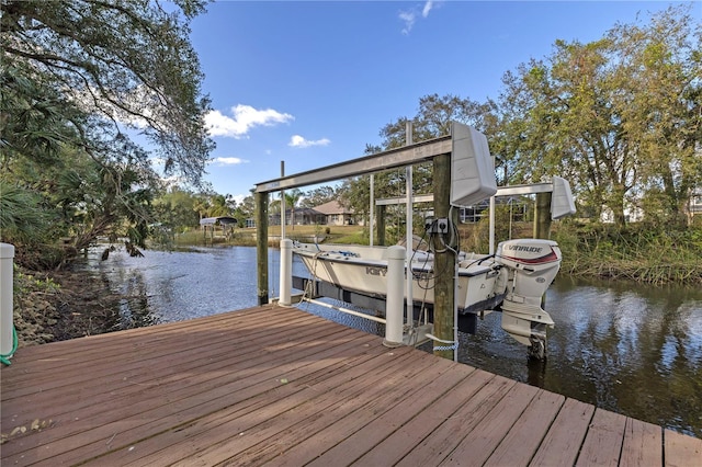 view of dock with a water view