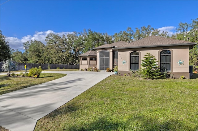 view of front of home with a front yard