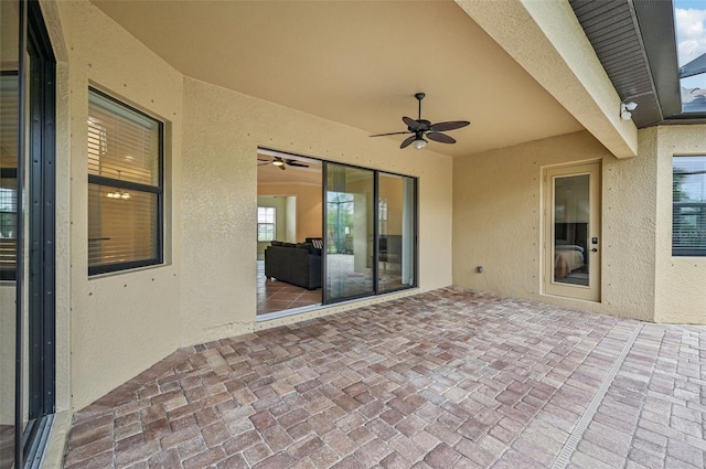 view of patio / terrace featuring ceiling fan