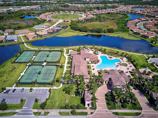 birds eye view of property featuring a water view