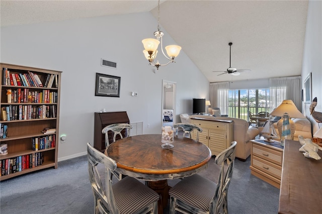 carpeted dining area with a textured ceiling, high vaulted ceiling, and ceiling fan with notable chandelier