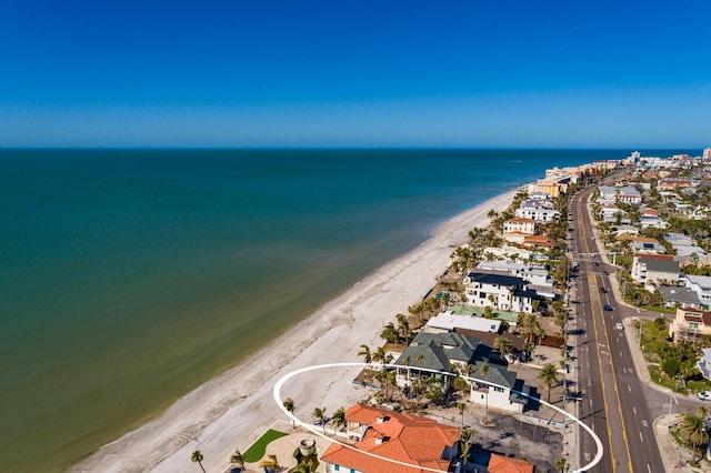 bird's eye view with a view of the beach and a water view