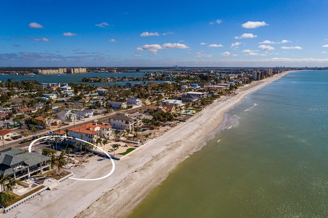 bird's eye view featuring a water view and a view of the beach