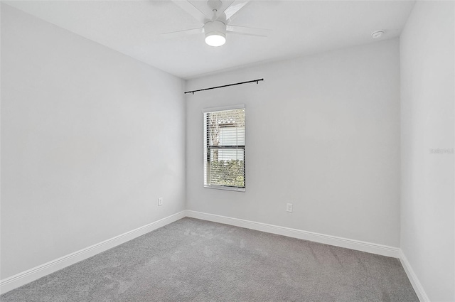 unfurnished room featuring carpet flooring and ceiling fan