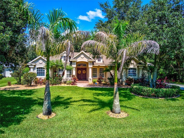 view of front of property with a front lawn