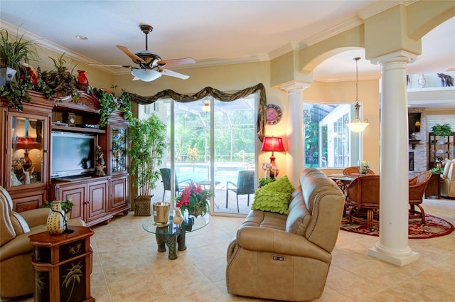 living room with ceiling fan, ornamental molding, and light tile patterned floors