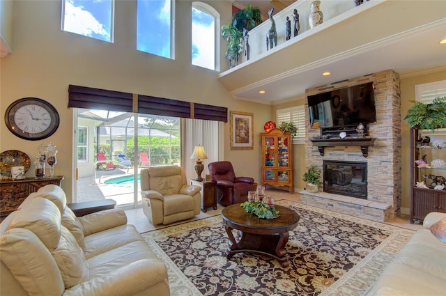 tiled living room featuring crown molding, a towering ceiling, and a fireplace