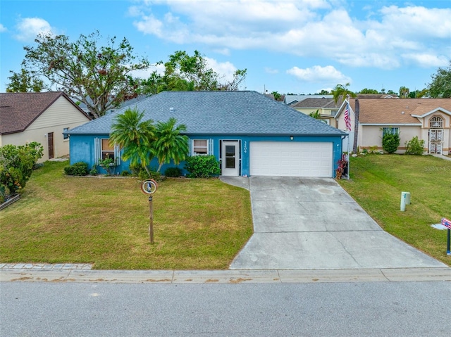 ranch-style home featuring a garage and a front lawn