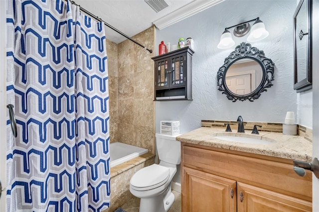 full bathroom featuring shower / bath combo, vanity, toilet, and crown molding