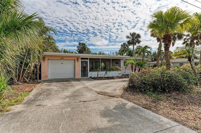 ranch-style house featuring a garage