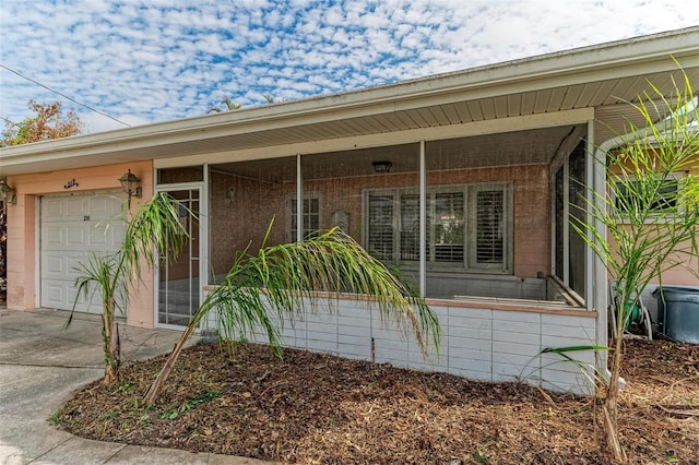 entrance to property featuring a garage