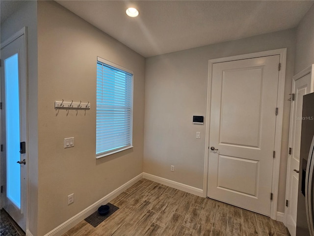 interior space with hardwood / wood-style floors