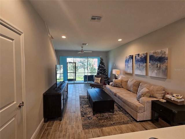 living room featuring ceiling fan