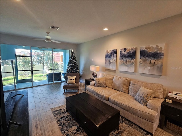 living room featuring ceiling fan