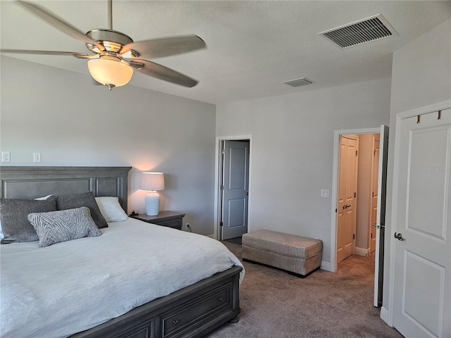 carpeted bedroom featuring ceiling fan