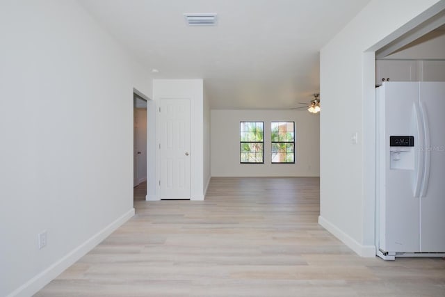 corridor featuring light wood-type flooring