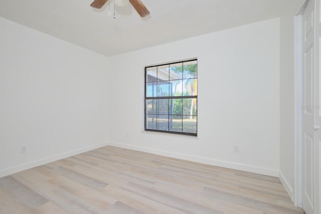 unfurnished room featuring ceiling fan and light hardwood / wood-style flooring