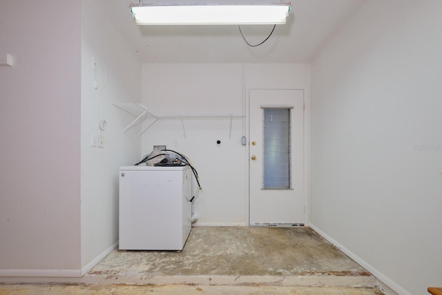 clothes washing area featuring washer / clothes dryer