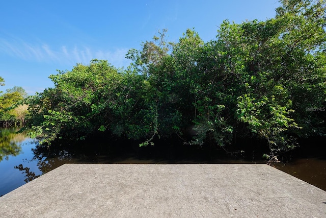 exterior space with a water view