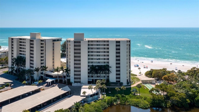 aerial view with a view of the beach and a water view