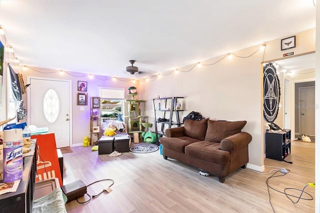 living room with light hardwood / wood-style flooring