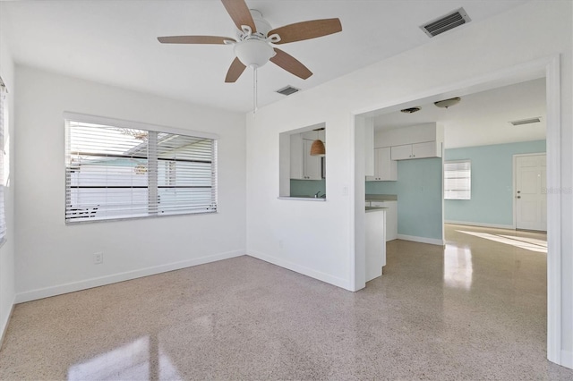 empty room with ceiling fan