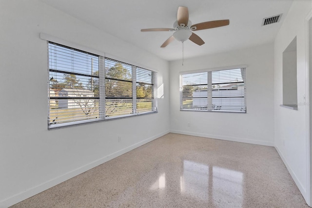 spare room featuring ceiling fan