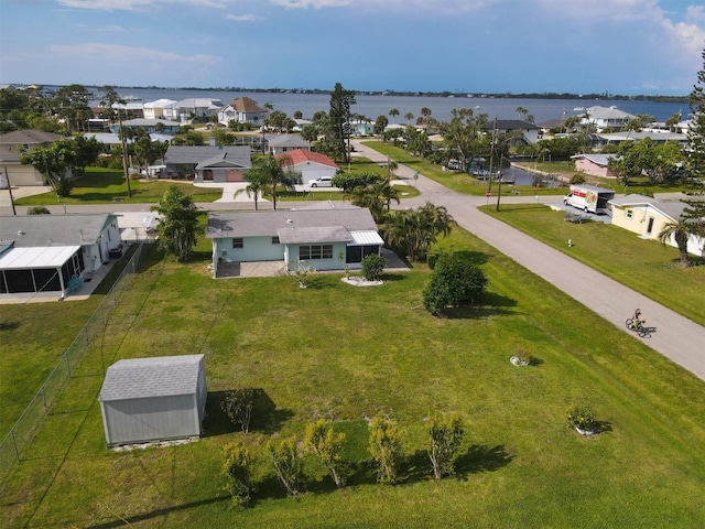 bird's eye view with a water view