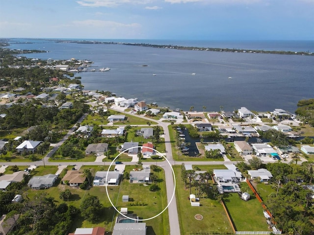 bird's eye view with a water view