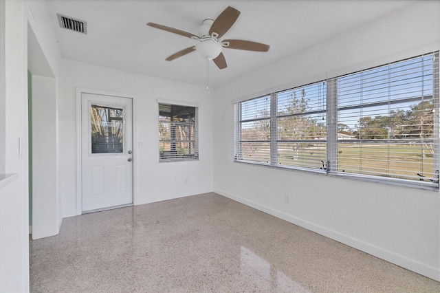 spare room with ceiling fan