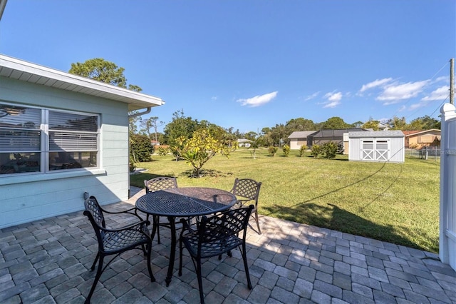 view of patio / terrace featuring a shed