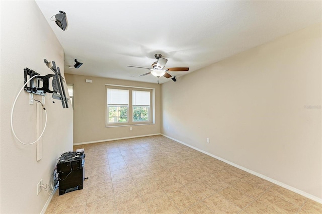 unfurnished room featuring ceiling fan