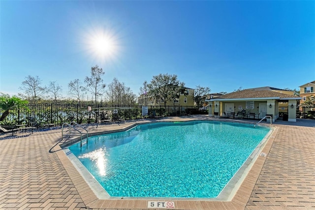 view of pool featuring a patio