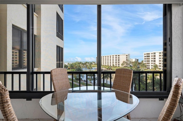 balcony featuring a water view