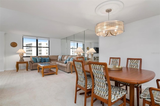 dining area with light carpet