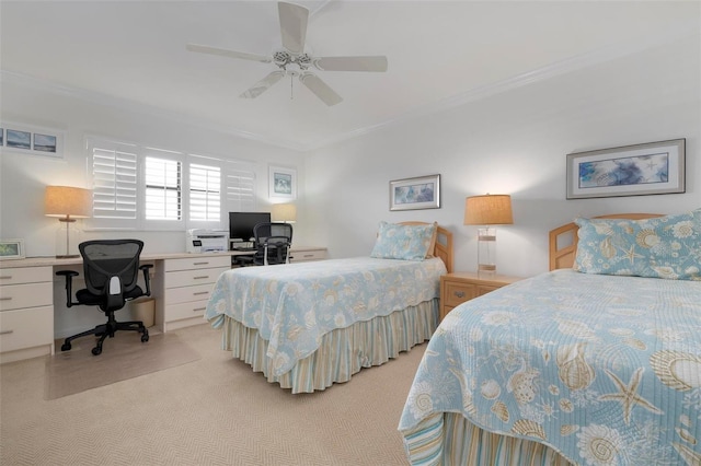 bedroom with ceiling fan, crown molding, and light colored carpet