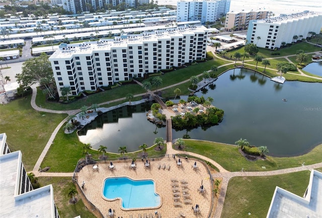 birds eye view of property featuring a water view