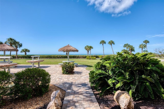 view of community featuring a lawn and a gazebo