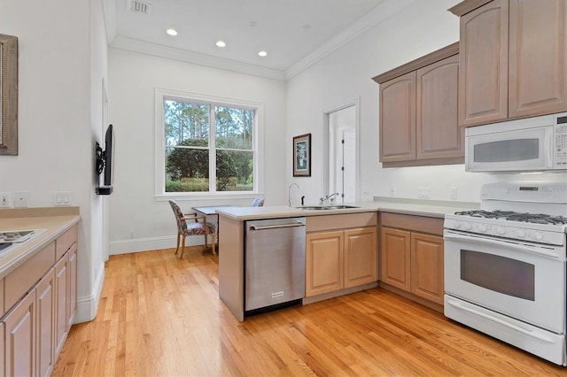 kitchen featuring kitchen peninsula, light brown cabinets, white appliances, light wood-type flooring, and crown molding